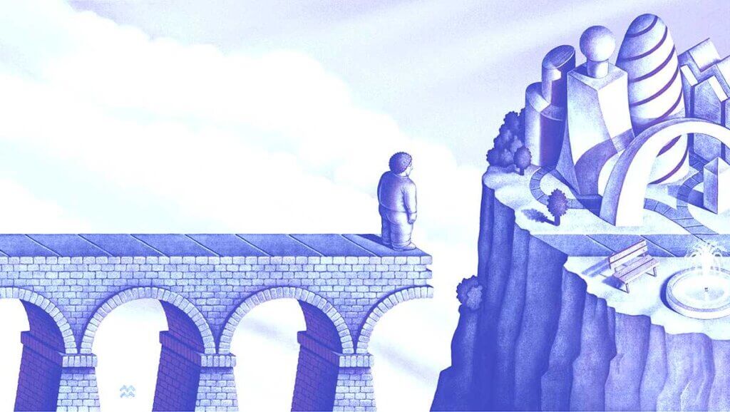 Man standing on brick bridge with a gap between him and a piece of land