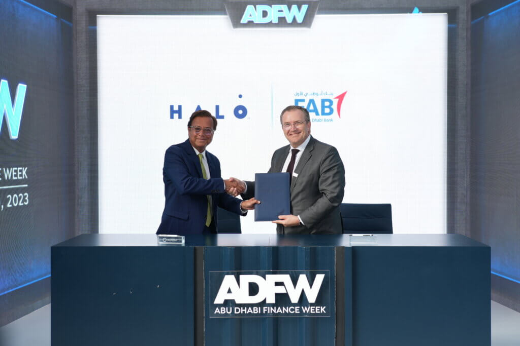 Member of Halo and MoU shaking hands