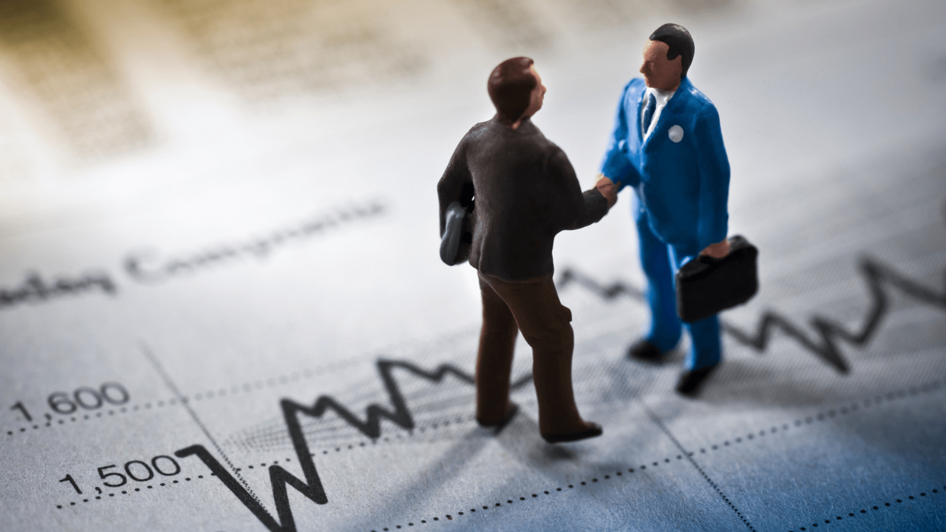 Illustration displaying a hiker on a lower peak looking at a higher peak of a mountain